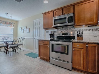 This PRISTINE 3/2 JASMINE Designer in the Village of CHARLOTTE on Pennbrooke Fairways in Florida - for sale on GolfHomes.com, golf home, golf lot