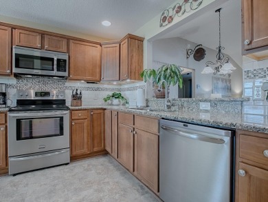 This PRISTINE 3/2 JASMINE Designer in the Village of CHARLOTTE on Pennbrooke Fairways in Florida - for sale on GolfHomes.com, golf home, golf lot
