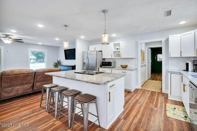 Welcome to 1012 E Moore St., a beautifully renovated ranch-style on The Lakes Country Club in North Carolina - for sale on GolfHomes.com, golf home, golf lot