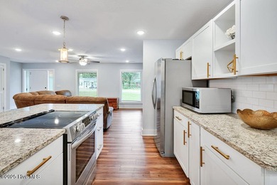 Welcome to 1012 E Moore St., a beautifully renovated ranch-style on The Lakes Country Club in North Carolina - for sale on GolfHomes.com, golf home, golf lot