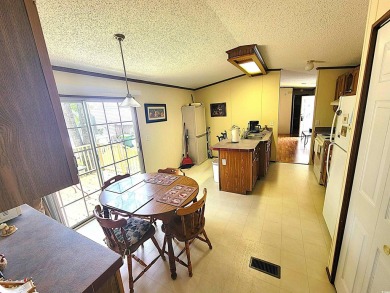 Well-Maintained, Furnished 2-Bed/2-Bath Home is just minutes to on Arrowhead Country Club in South Carolina - for sale on GolfHomes.com, golf home, golf lot