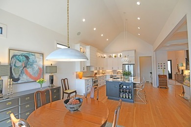 Where Lakefront Luxury Meets Timeless Design.  524 Grand Harbor on The Patriot Golf Club At Grand Harbor in South Carolina - for sale on GolfHomes.com, golf home, golf lot