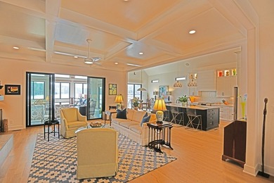 Where Lakefront Luxury Meets Timeless Design.  524 Grand Harbor on The Patriot Golf Club At Grand Harbor in South Carolina - for sale on GolfHomes.com, golf home, golf lot