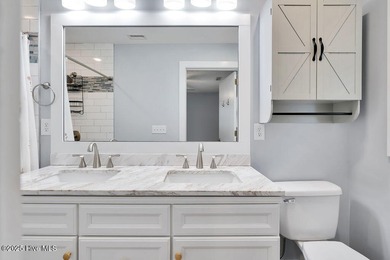 Welcome to 1012 E Moore St., a beautifully renovated ranch-style on The Lakes Country Club in North Carolina - for sale on GolfHomes.com, golf home, golf lot