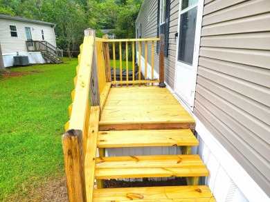 Well-Maintained, Furnished 2-Bed/2-Bath Home is just minutes to on Arrowhead Country Club in South Carolina - for sale on GolfHomes.com, golf home, golf lot
