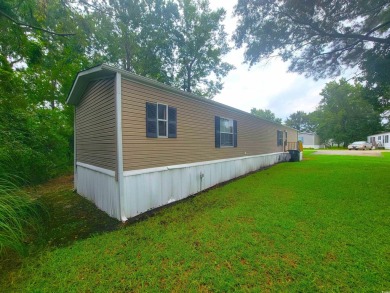Well-Maintained, Furnished 2-Bed/2-Bath Home is just minutes to on Arrowhead Country Club in South Carolina - for sale on GolfHomes.com, golf home, golf lot