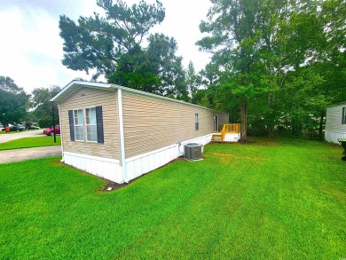 Well-Maintained, Furnished 2-Bed/2-Bath Home is just minutes to on Arrowhead Country Club in South Carolina - for sale on GolfHomes.com, golf home, golf lot