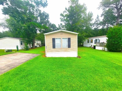 Well-Maintained, Furnished 2-Bed/2-Bath Home is just minutes to on Arrowhead Country Club in South Carolina - for sale on GolfHomes.com, golf home, golf lot