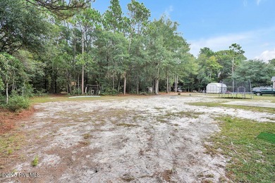 Welcome to 1012 E Moore St., a beautifully renovated ranch-style on The Lakes Country Club in North Carolina - for sale on GolfHomes.com, golf home, golf lot