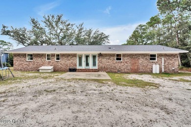 Welcome to 1012 E Moore St., a beautifully renovated ranch-style on The Lakes Country Club in North Carolina - for sale on GolfHomes.com, golf home, golf lot