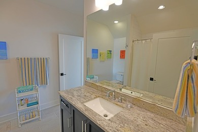 Where Lakefront Luxury Meets Timeless Design.  524 Grand Harbor on The Patriot Golf Club At Grand Harbor in South Carolina - for sale on GolfHomes.com, golf home, golf lot