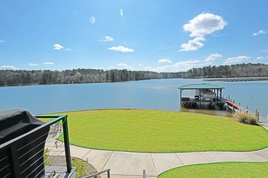 Where Lakefront Luxury Meets Timeless Design.  524 Grand Harbor on The Patriot Golf Club At Grand Harbor in South Carolina - for sale on GolfHomes.com, golf home, golf lot