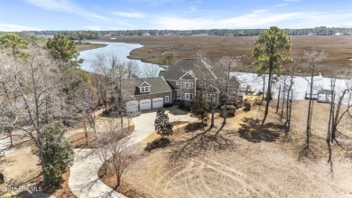 Welcome to this exquisite riverfront property, located in a golf on Carolina National Golf Club in North Carolina - for sale on GolfHomes.com, golf home, golf lot