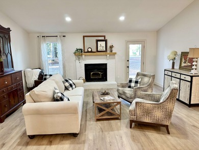 This beautifully remodeled home is truly move-in ready, offering on Wildwood Country Club in Florida - for sale on GolfHomes.com, golf home, golf lot