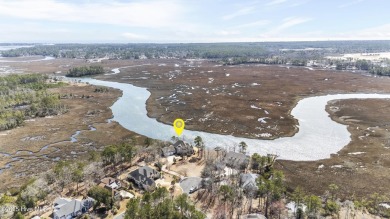 Welcome to this exquisite riverfront property, located in a golf on Carolina National Golf Club in North Carolina - for sale on GolfHomes.com, golf home, golf lot