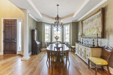Welcome to this exquisite riverfront property, located in a golf on Carolina National Golf Club in North Carolina - for sale on GolfHomes.com, golf home, golf lot