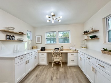 This beautifully remodeled home is truly move-in ready, offering on Wildwood Country Club in Florida - for sale on GolfHomes.com, golf home, golf lot