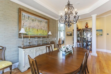 Welcome to this exquisite riverfront property, located in a golf on Carolina National Golf Club in North Carolina - for sale on GolfHomes.com, golf home, golf lot