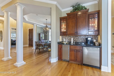 Welcome to this exquisite riverfront property, located in a golf on Carolina National Golf Club in North Carolina - for sale on GolfHomes.com, golf home, golf lot