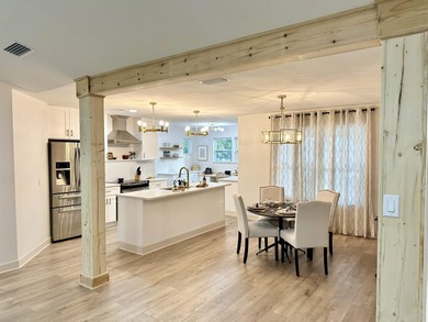 This beautifully remodeled home is truly move-in ready, offering on Wildwood Country Club in Florida - for sale on GolfHomes.com, golf home, golf lot