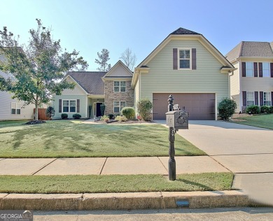 4 bedrooms and 3 full baths, including a spacious owner's suite on Summergrove Golf Club in Georgia - for sale on GolfHomes.com, golf home, golf lot