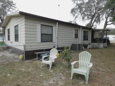 Move in ready 2 bedroom/2 bath  manufactured home on easy to on Chiefland Golf and Country Club in Florida - for sale on GolfHomes.com, golf home, golf lot