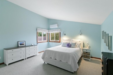 Discover contemporary charm in this beautifully designed on Saddle Ridge Golf Club in Wisconsin - for sale on GolfHomes.com, golf home, golf lot