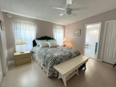Immaculate 2-bd 2-ba Stucco home with a lovely golf course view on Del Tura Golf and Country Club in Florida - for sale on GolfHomes.com, golf home, golf lot