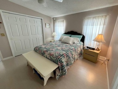 Immaculate 2-bd 2-ba Stucco home with a lovely golf course view on Del Tura Golf and Country Club in Florida - for sale on GolfHomes.com, golf home, golf lot