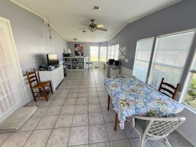 Immaculate 2-bd 2-ba Stucco home with a lovely golf course view on Del Tura Golf and Country Club in Florida - for sale on GolfHomes.com, golf home, golf lot