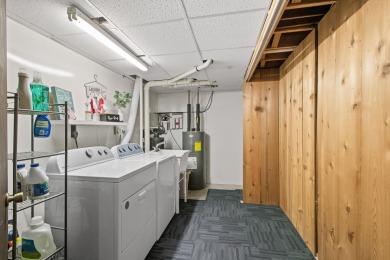 Discover contemporary charm in this beautifully designed on Saddle Ridge Golf Club in Wisconsin - for sale on GolfHomes.com, golf home, golf lot
