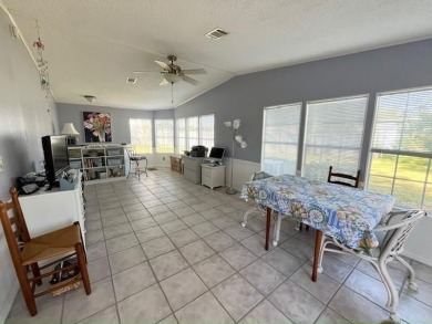 Immaculate 2-bd 2-ba Stucco home with a lovely golf course view on Del Tura Golf and Country Club in Florida - for sale on GolfHomes.com, golf home, golf lot