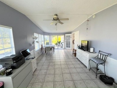 Immaculate 2-bd 2-ba Stucco home with a lovely golf course view on Del Tura Golf and Country Club in Florida - for sale on GolfHomes.com, golf home, golf lot