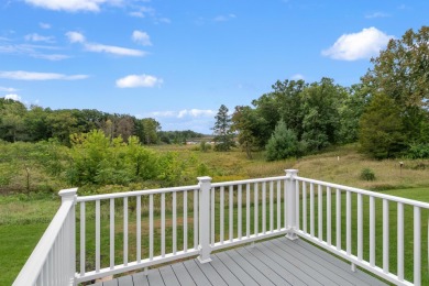Discover contemporary charm in this beautifully designed on Saddle Ridge Golf Club in Wisconsin - for sale on GolfHomes.com, golf home, golf lot
