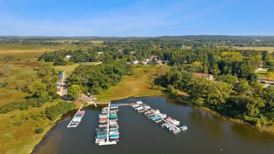 Discover contemporary charm in this beautifully designed on Saddle Ridge Golf Club in Wisconsin - for sale on GolfHomes.com, golf home, golf lot