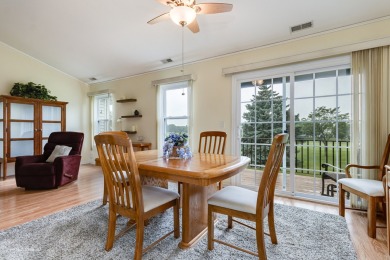 Stunning second floor unit with gorgeous panoramic golf course on The Links at Carillon in Illinois - for sale on GolfHomes.com, golf home, golf lot