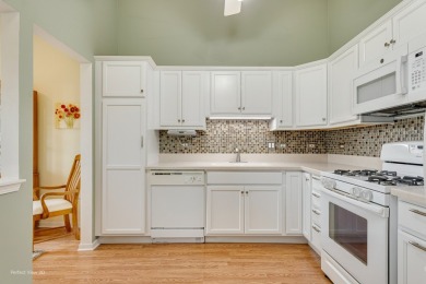 Stunning second floor unit with gorgeous panoramic golf course on The Links at Carillon in Illinois - for sale on GolfHomes.com, golf home, golf lot