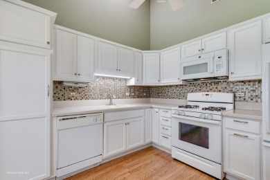 Stunning second floor unit with gorgeous panoramic golf course on The Links at Carillon in Illinois - for sale on GolfHomes.com, golf home, golf lot