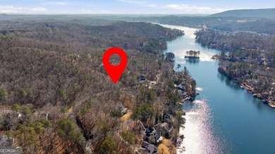 Seasonal lake views and just steps from the water! This 0 on The Highlands Course at Lake Arrowhead in Georgia - for sale on GolfHomes.com, golf home, golf lot