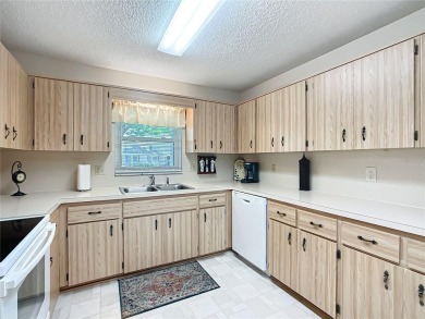 Furnished or Unfurnished! Move-in ready Birmingham model villa on On Top of the World Golf Course in Florida - for sale on GolfHomes.com, golf home, golf lot