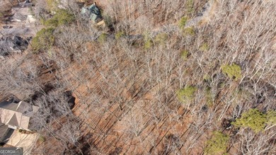 Seasonal lake views and just steps from the water! This 0 on The Highlands Course at Lake Arrowhead in Georgia - for sale on GolfHomes.com, golf home, golf lot