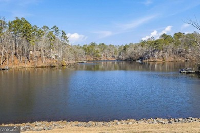 Seasonal lake views and just steps from the water! This 0 on The Highlands Course at Lake Arrowhead in Georgia - for sale on GolfHomes.com, golf home, golf lot