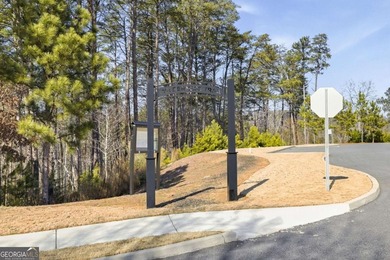 Seasonal lake views and just steps from the water! This 0 on The Highlands Course at Lake Arrowhead in Georgia - for sale on GolfHomes.com, golf home, golf lot