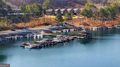 Seasonal lake views and just steps from the water! This 0 on The Highlands Course at Lake Arrowhead in Georgia - for sale on GolfHomes.com, golf home, golf lot
