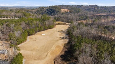 Seasonal lake views and just steps from the water! This 0 on The Highlands Course at Lake Arrowhead in Georgia - for sale on GolfHomes.com, golf home, golf lot