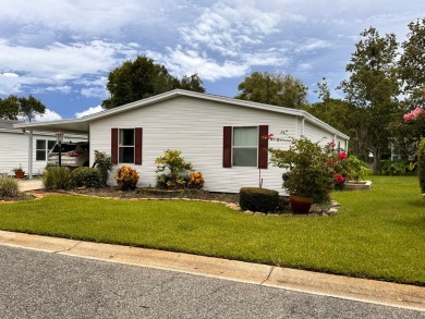 This home not only has 3 bedrooms and 2 bathrooms but a closed on Whisperwood Golf Course in Florida - for sale on GolfHomes.com, golf home, golf lot