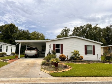 This home not only has 3 bedrooms and 2 bathrooms but a closed on Whisperwood Golf Course in Florida - for sale on GolfHomes.com, golf home, golf lot