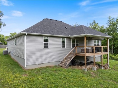 Welcome to 12 Lockhart Drive, a well-maintained 2023-built home on Bella Vista Country Club - Highlands in Arkansas - for sale on GolfHomes.com, golf home, golf lot