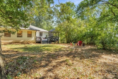 This charming, updated home is move-in ready, and ideally on Ansley Golf Club At Mid-Town in Georgia - for sale on GolfHomes.com, golf home, golf lot