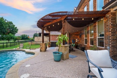 Located in a prestigious gated community in Frisco, this on Heritage Lakes - Par 3 - 9 Hole Course in Texas - for sale on GolfHomes.com, golf home, golf lot